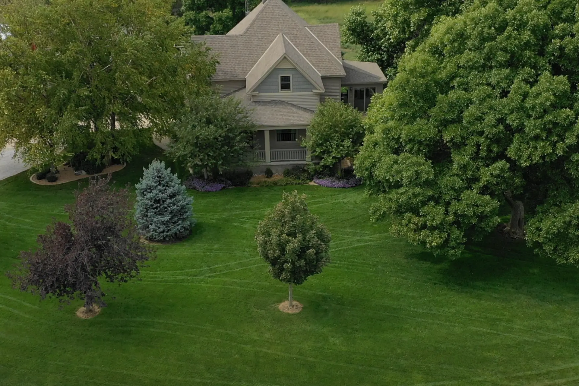 Healthy green cool-season lawn at a Lincoln, Nebraska home in summer