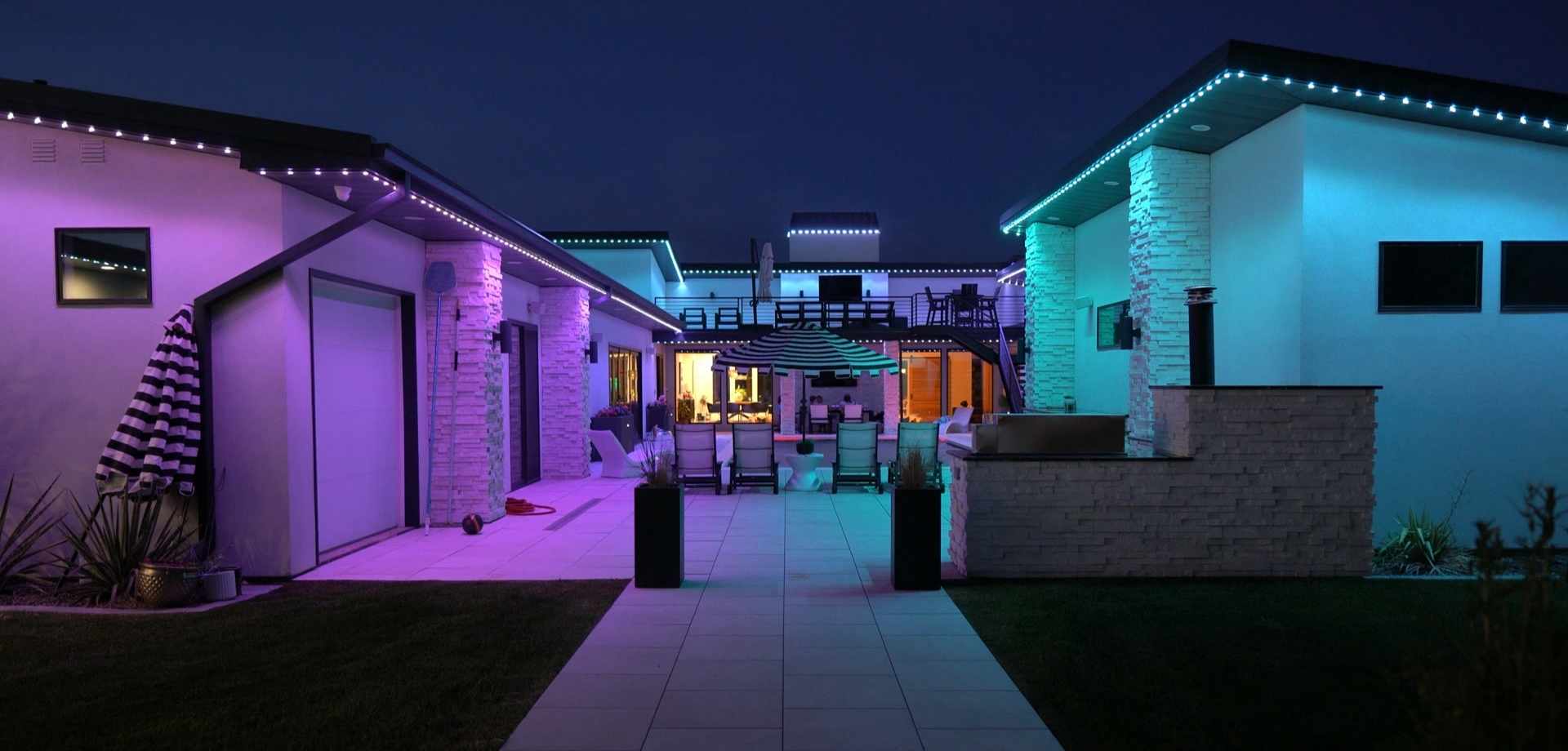 Bosso Smart Lighting permanent roofline lighting showing purple and teal color zones
