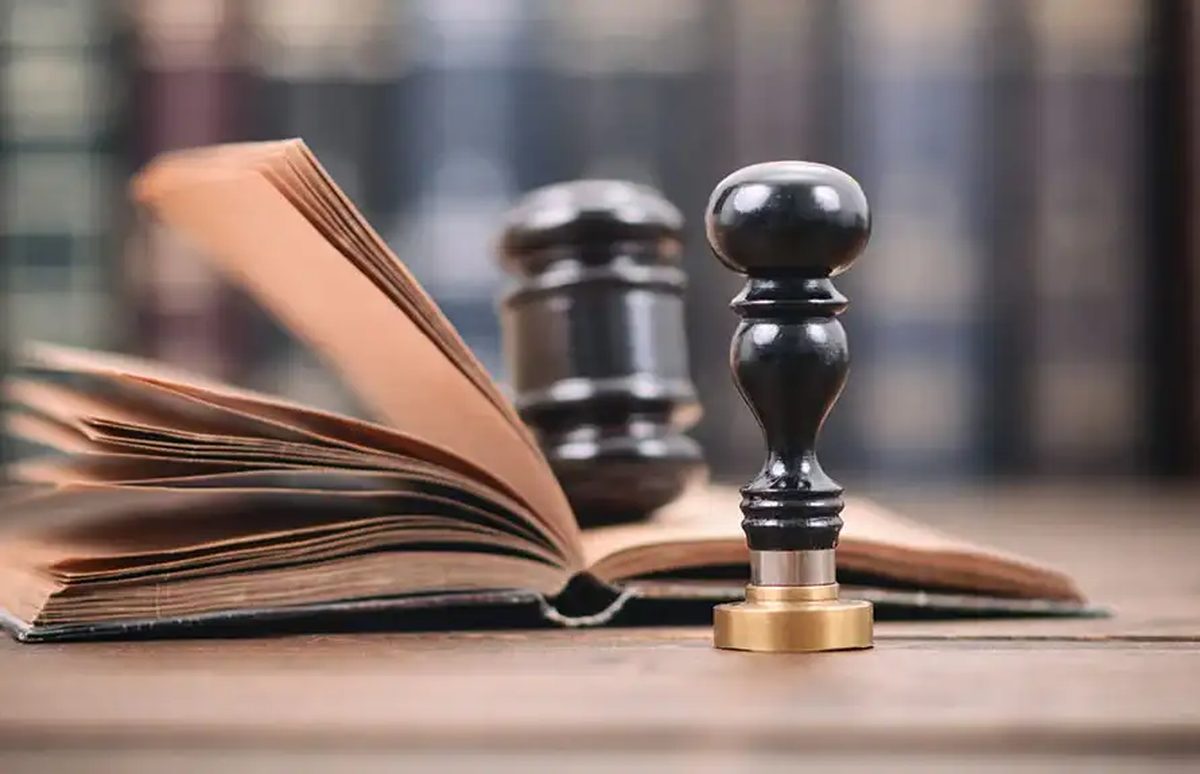 A gavel and an open law book representing the Arkansas probate process