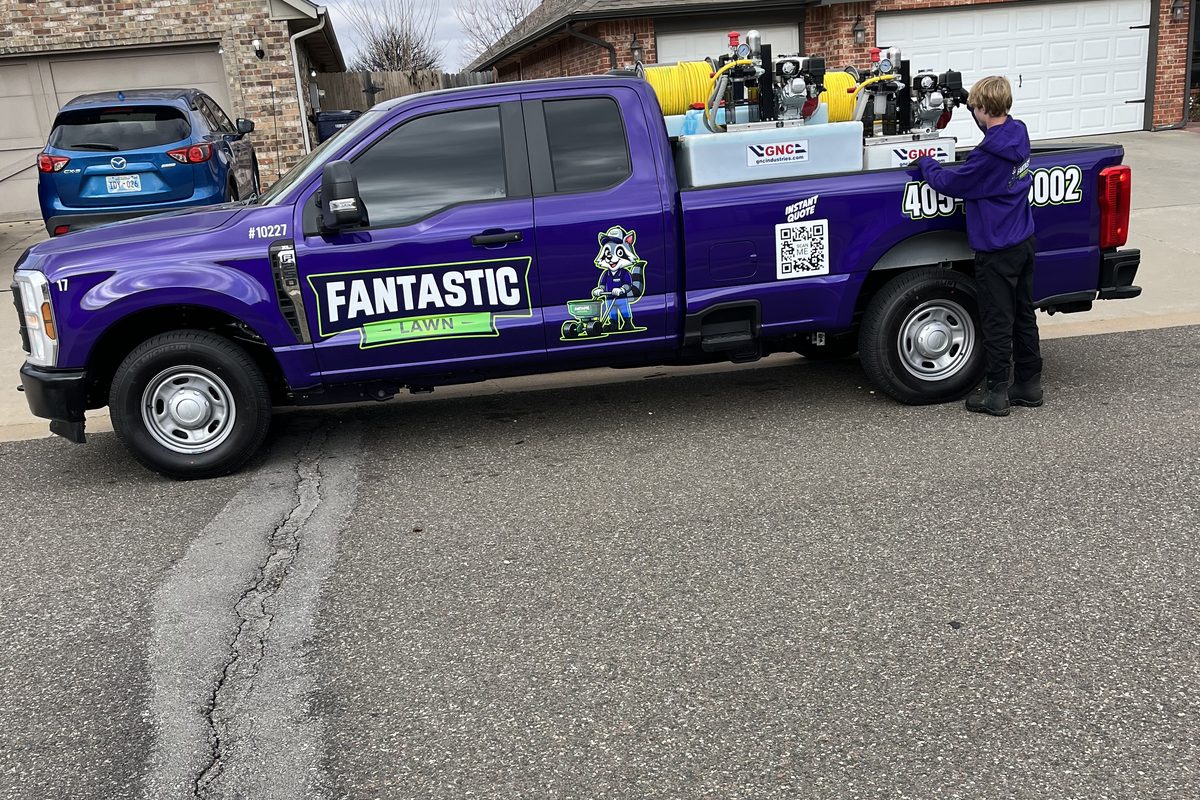 A Fantastic Lawn truck parked at a home for a fall fertilization visit in Oklahoma City