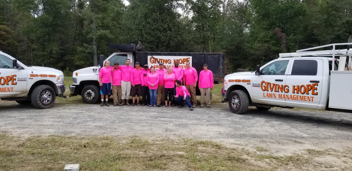 The Giving Hope Lawn Management crew, who install grading and drainage for foundation waterproofing
